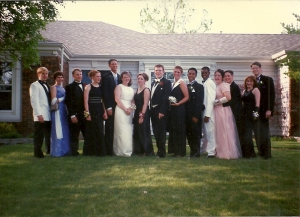 Here is the group that went to the Senior Prom in 1997.  I am in the pink on the right being ADORED by Michael!  Chris is the tall one- duh.  So, 5 out of the 8 gentlemen in this photo are out now.  How you like them odds!  :)